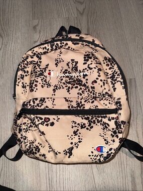 Champion Beige and Black Leopard Print Mini Backpack